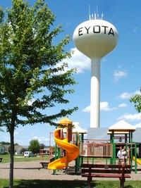 West Side Park features: Frisbee golf course, skate park, ball diamonds, play area, picnic shelter, paved walking path.